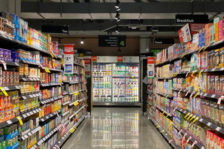 white and red labeled pack on white shelf